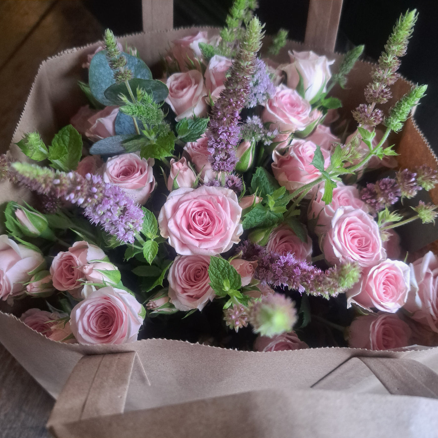 Spray roses and herb posy