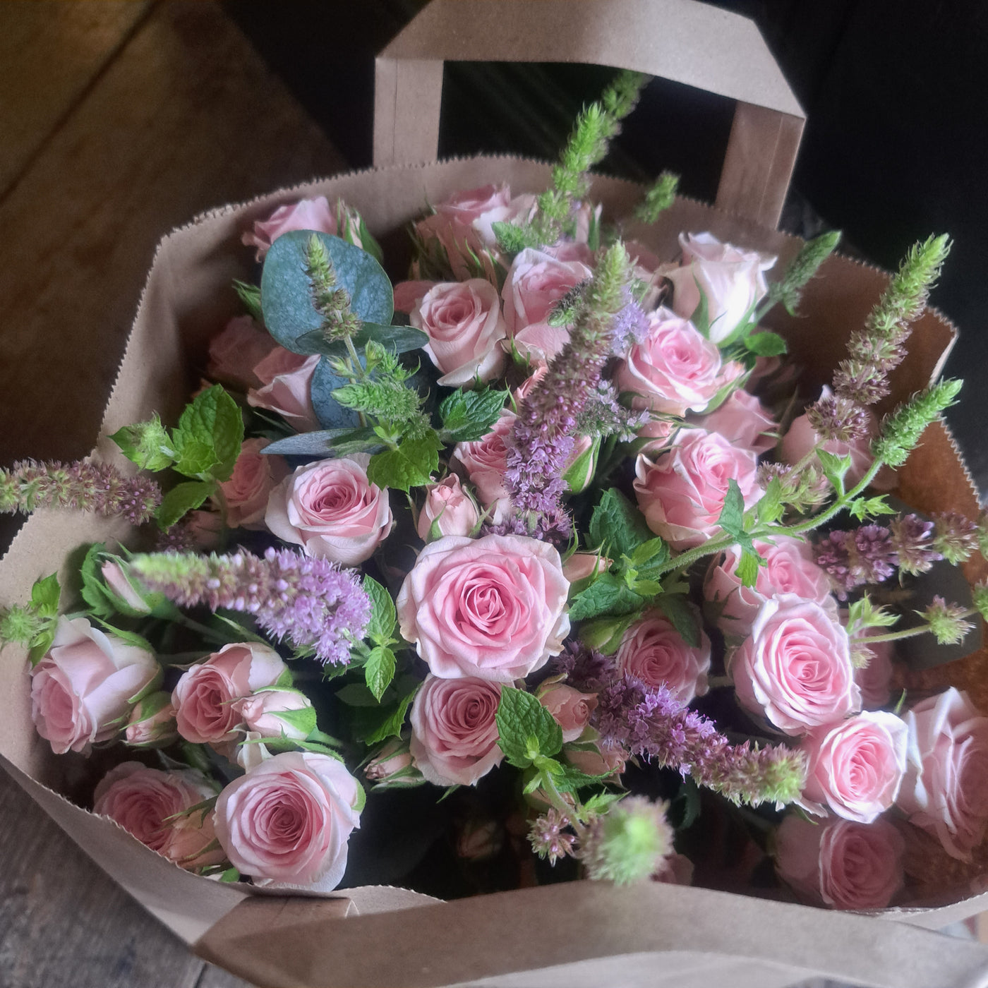 Spray roses and herb posy